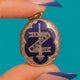 Black Enamel In Memory Of locket, memorial face and torch