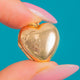 Small Vintage 9ct B&F Puffy Heart Locket - Half Engraved 3g, half-engraved heart front on blue background