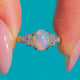 Vivid Art Deco 18ct Gold & Platinum Opal Diamond Ring — front on blue
