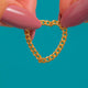 Antique 15ct Gold Curb Link Chain Ring, complete chain ring held against blue