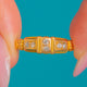 Antique Gold Diamond stacking ring, front view of three raised panels and six Diamonds