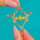 Gold bow lavalier with green Peridot, Pearl accents and an Amethyst drop
