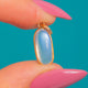 Antique 9ct Gold Ceylon Moonstone Charm, front detail of the blue-sheened Moonstone